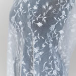Embroidery on tulle or sheer